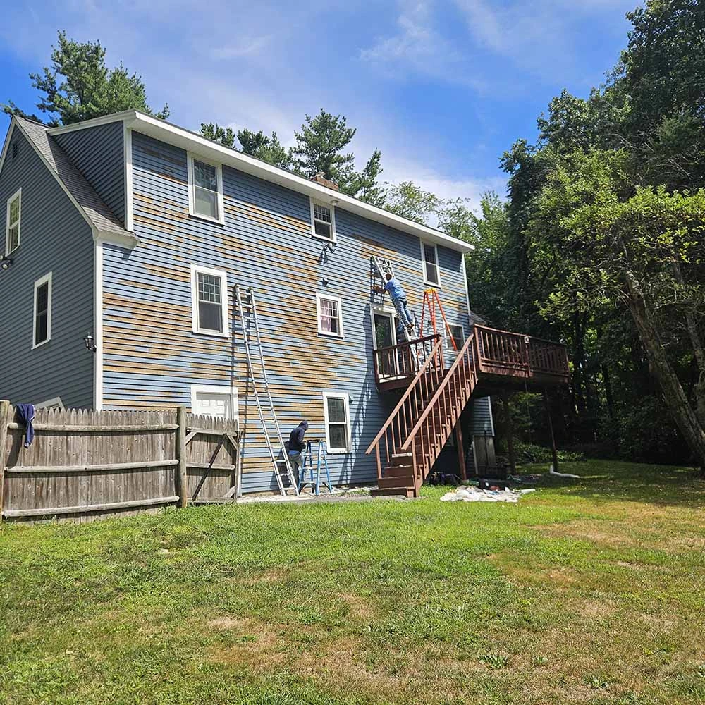 How to Remove Paint From Vinyl Siding